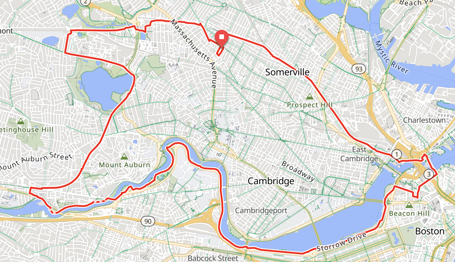 A map of a bike route, looping around Cambridge, touching Somerville, Boston, and Arlington, mostly along the Somerville Community Path and the Charles River.
